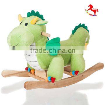 playful plush baby rocker with music on wooden base ride on toy