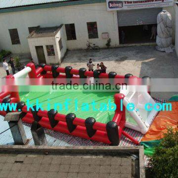 red inflatable football pitch/field/court