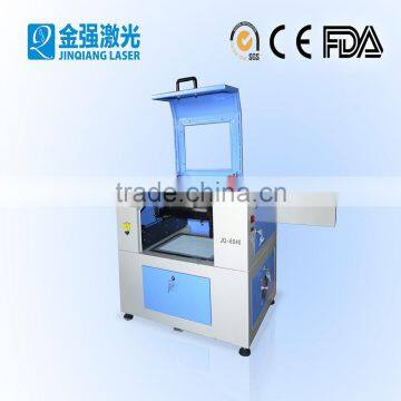 Mini size laser cutting and engraving machine with CE FDA leather cloth engraving machine