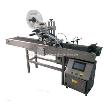 automatic flat label applicator machine for plastic bag paper pouch labeling machine