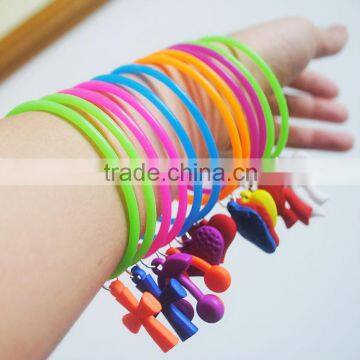 Colorful silicone silly bands with charm