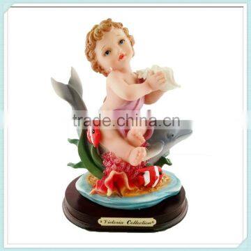 Cherub on dolphin resin angel statues wholesale