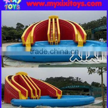 XIXI giant dual lane inflatable water slide with large swimming pool                        
                                                                                Supplier's Choice