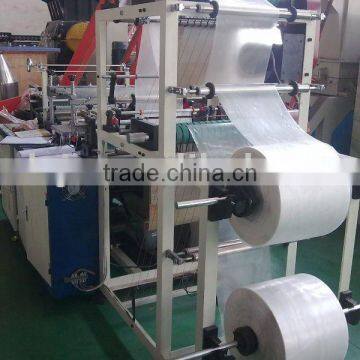 Glove making machine