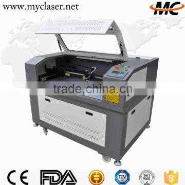 MC 9060 beautifully design denim jeans popular clothing laser cutting and engraving machine price