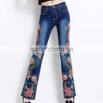 In the spring of new high-end women's fashion micro bead embroidered jeans La thorn