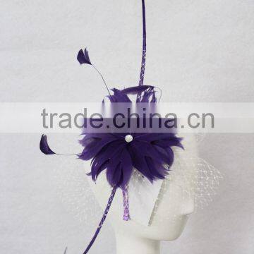 Purple and Ivory feather fascinator with birdcage veil on metal band                        
                                                Quality Choice