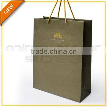 White kraft paper bag with gold stamping