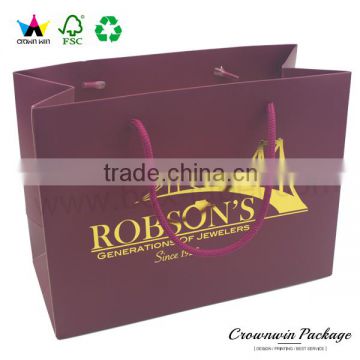 New-style gold hot stamp logo on matte packaging paper bags