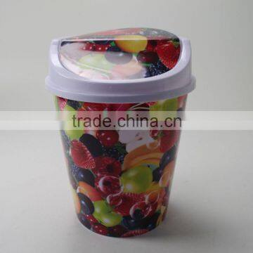 Plastic waste bin with lid