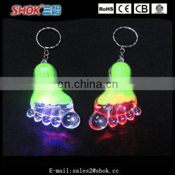 Promotion item foot shaped flashing led keychain for girls