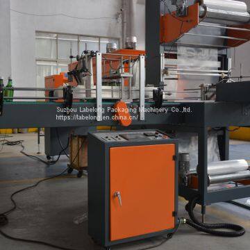 AUTOMATIC SHRINK FILM PACKAGING MACHINE