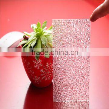 Embossed solid polycarbonate sheet