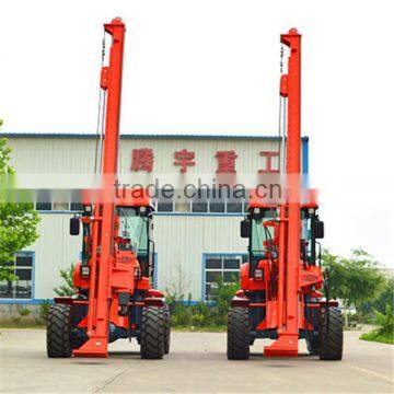 pile driver with quick coupling of hammer or screw driving head