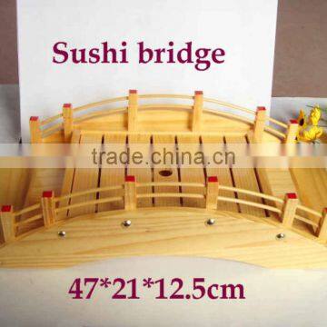 Wooden sushi bridge