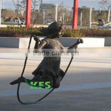 Bronze kid rope skipping sculpture