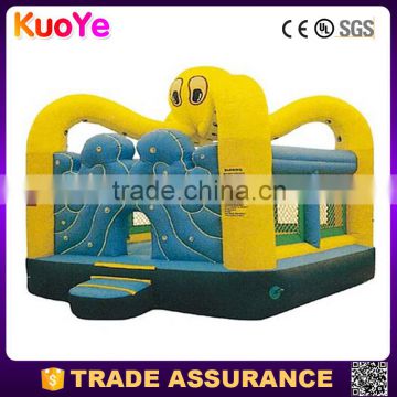 yellow octopus type inflatable bounce house for rental