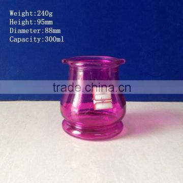 300ml colored glass candle holders with metal handle                        
                                                                                Supplier's Choice