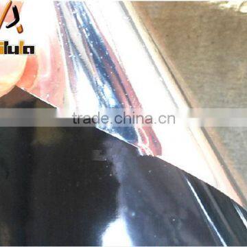 Self adhesive one way vision vinyl window film