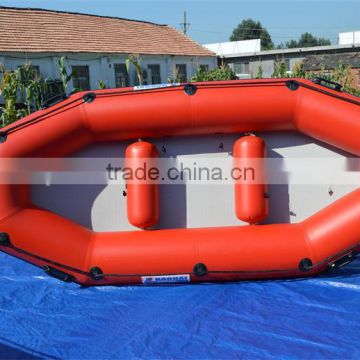 red inflatable rubber boat without motor