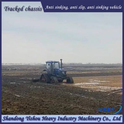 High horsepower tractor modified with triangular track wheels, anti sinking and anti-skid on muddy ground