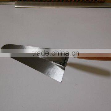 Carbon steel hand trowel with wood handle