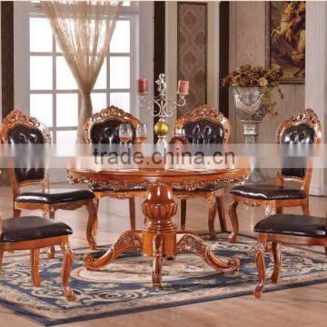 European antique round hand carved dining table and chairs