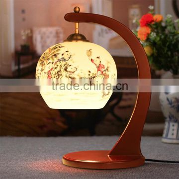 China porcelain white ball with wood C frame design desk lamp