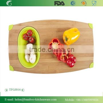 TFGJ016/novelty practical vegetable cutting board with silicone anti skidding mat carbonized chopping block with silicone pad