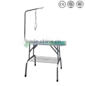 Pet grooming instrument grooming table