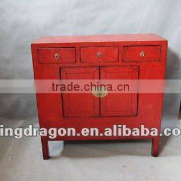 Two door three drawer red cabinet