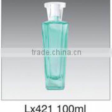 Green empty long glass perfume bottle with transparent cover