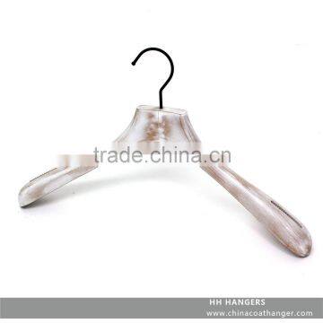 The HEAD wooden suit hanger antique white sanding finish,very pretty hanging effect,shoulder non-slip sticker