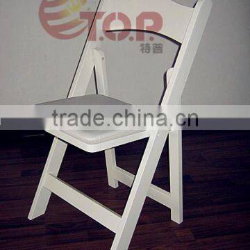 White Padded Resin Folding Chair