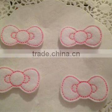 Hot sell Adorable white and pink Embroidered Felt Applique bow shape made in China