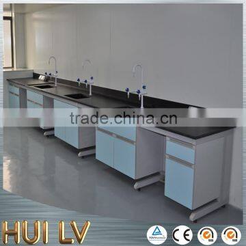 Good quality laboratory steel and wood wall service bench