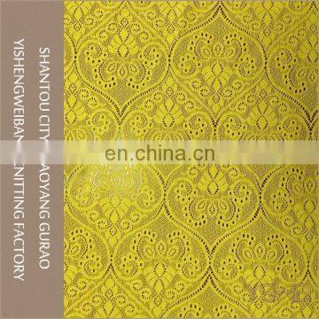 Beautiful unique pattern knitted elastic gold sparkle lace fabric