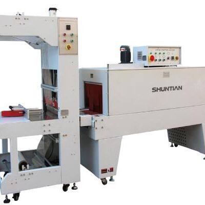 A Dozen Bottles Plastic Film Shrink Wrapping Machine