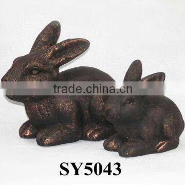 Antique brass rabbit garden statue
