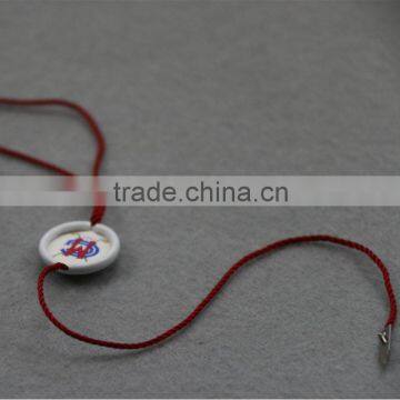 metal seal hang tags with dark red polyster line &hand tablet for colthes