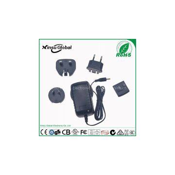 Interchangeable plugs power adapter 12V 1.5A