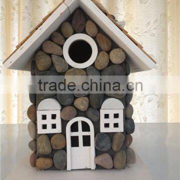 New handmade cobblestone with nature wooden birdhouse brown