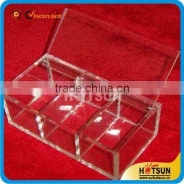 clear plexiglass display boxes within a grid