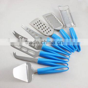 Plastic handle cheese knife, cheese grater and cheese slicer