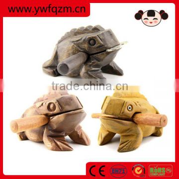 child wooden croaking frog toy