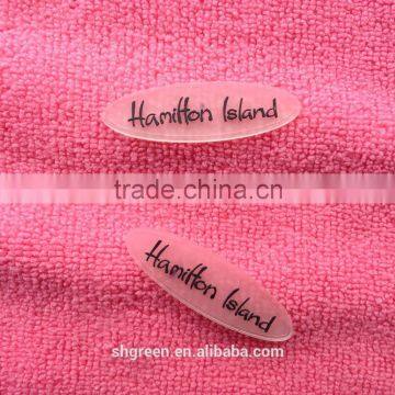 Waterproof transparent PVC rubber label for swimwear