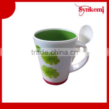 Plastic drinking cup with spoon