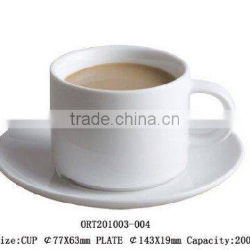 White ceramic mug with saucer