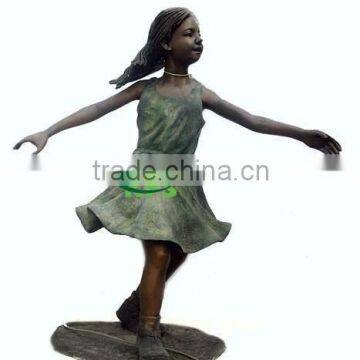 Bronze circled little girl in yard sculpture