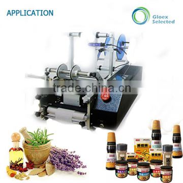 Semi automatic round glass bottle labeling machine